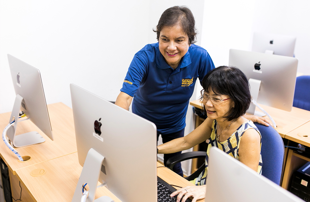 Miss Noorjahan Kamaruddin, giving a fellow senior a hands-on session